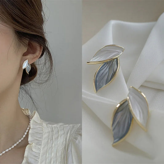 Boucle d'oreille fleurs dorées