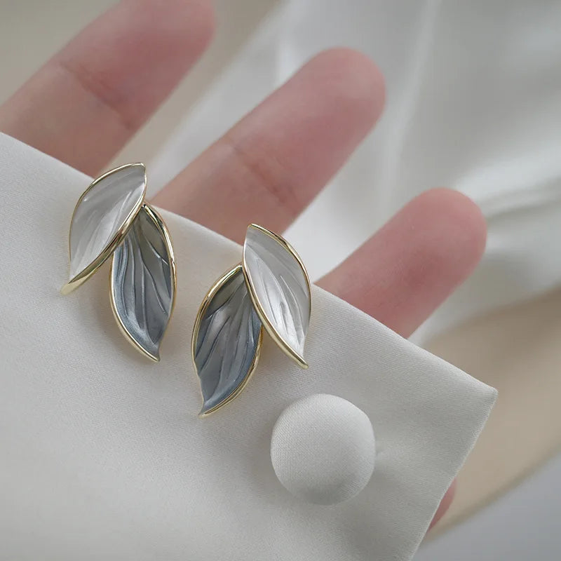 Boucle d'oreille fleurs dorées