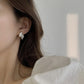Boucle d'oreille fleurs dorées