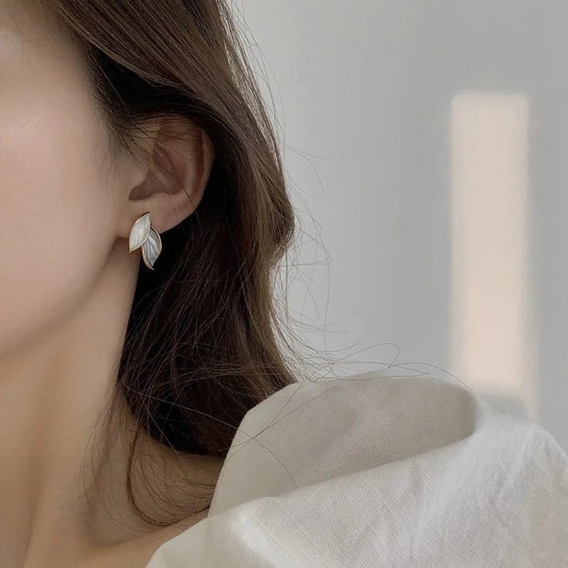Boucle d'oreille fleurs dorées